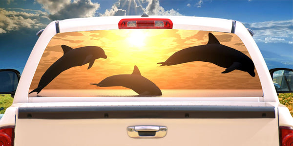 Dolphin leaping at sunset window mural decal