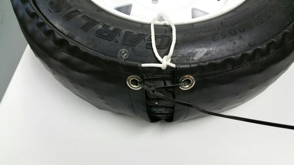 back of tire 90 pound rope tie and grommets with locking zip tie