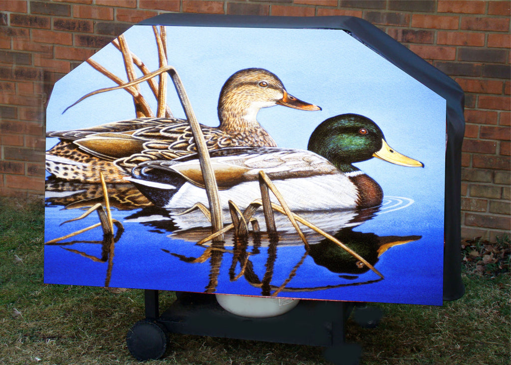 Blue water mallard ducks floating in a lake bbq grill cover