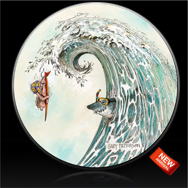 Surfer over the fall of the wave with shark waiting spare tire cover